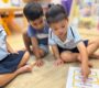 Preschool children learning names in classroom activity 90x80