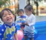 Children having water play at Starshine Montessori preschool 90x80