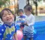 Children having water play at Starshine Montessori preschool 90x80